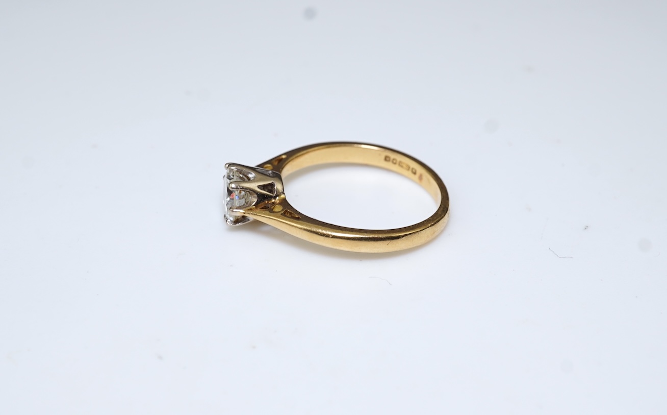 A diamond solitaire ring
